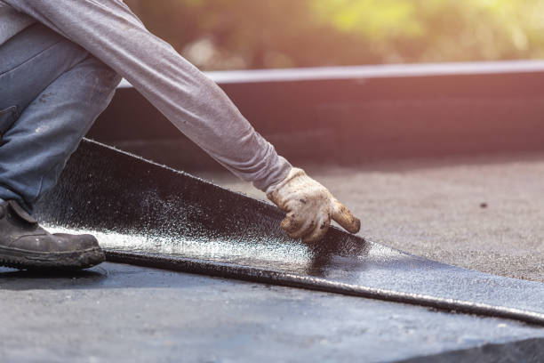 Professional Basement Waterproofing technician working in Eland, WI